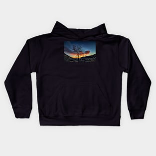 The Silhouette of a Tree Against Clouds Being Lit By the Sunrise Kids Hoodie